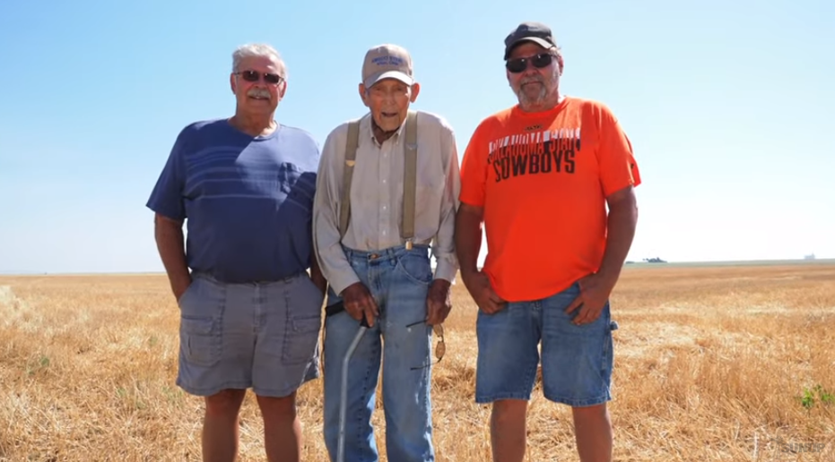 Bringing In The Wheat Crop At Age 100